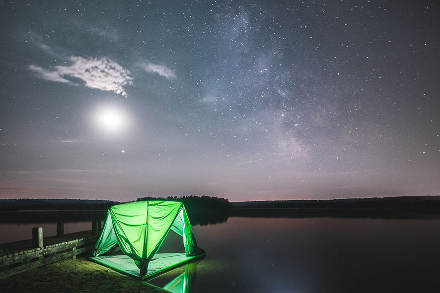 universe tree tent on water illuminated at night (2033231036489)