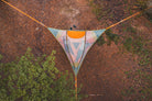 Aerial shot of couple in tree tent (6835887636553)